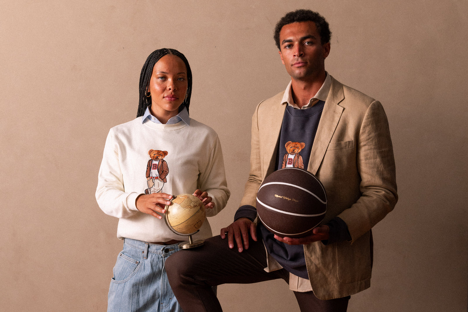 Students wearing Crew Dog hand-drawn embroidered collegiate sweatshirts